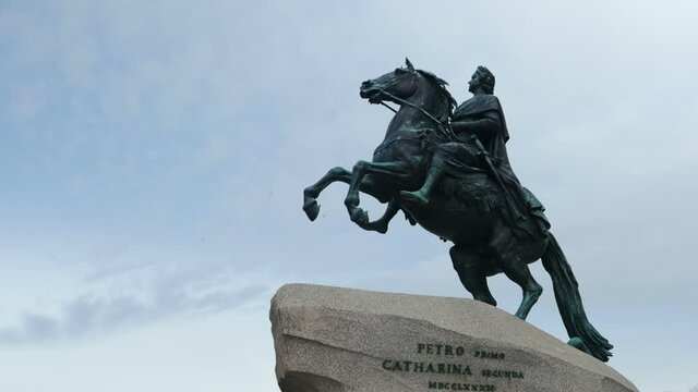St. Petersburg, Russia, March 6, 2021, bronze horseman on a granite pedestal, a monument to Emperor Peter the Great against the background of flying clouds landmark of St. Petersburg