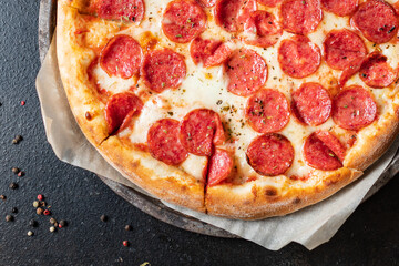 salami pizza pepperoni fast food Takeaway snack healthy meal top view copy space for text food background rustic image