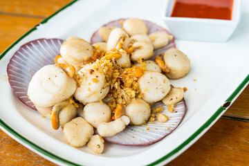 Fried scallop with garlic - close up