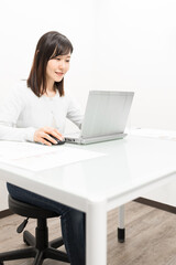 Woman working on a laptop PC