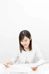 Woman viewing materials at a meeting