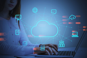 Businesswoman with laptop, double exposure of cloud