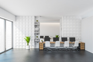 White and grey office room with furniture and window