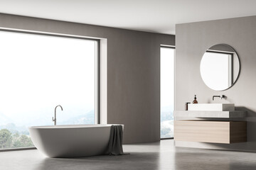 Fototapeta na wymiar Modern bathroom interior with sink and white bathtub near window in eco minimalist style. No people. 3D Rendering