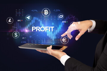 Close-up of a touchscreen with PROFIT inscription, business opportunity concept