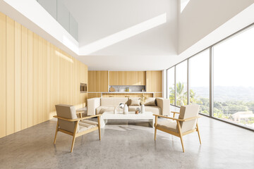 Fototapeta na wymiar Wooden kitchen set with sofa and armchairs near panoramic window