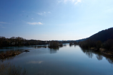 Fototapeta na wymiar beautiful view of the neckar river in germany under a blue sky