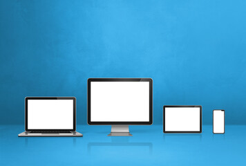 computer, laptop, mobile phone and digital tablet pc. blue background