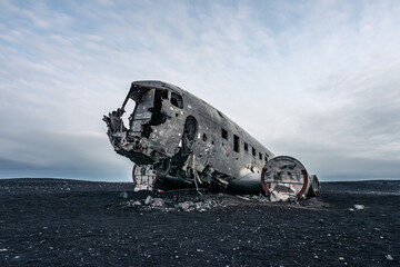 Sólheimasandur, Plane wreck at a black sand beach in Iceland with no people at sunset
