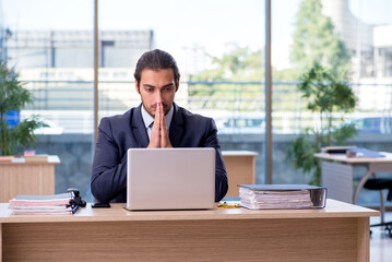 Young businessman employee working in the office