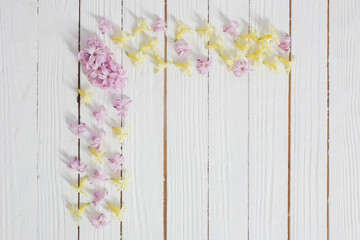 flowers of  hyacinths on white wooden background