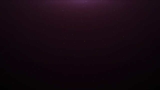 Purple gold dust particles glimmering on black background. Beautiful easy to use as an overlay on your footage.