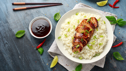 Teriyaki chicken with rice and red cabbage salad. Asian style food