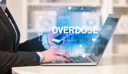 Doctor working a health check with OVERDOSE inscription, recording medical test results