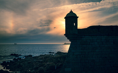 Lighthouse Silhouette at Sunset in Senhora da Luz