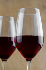 Two glasses with red wine close-up. Drinking wine. Wineglass