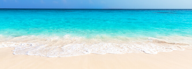 Panorama of wave of the sea on the sand beach in Punta Cana, Dominican Republic. - 418766391