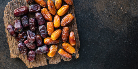 date fruit sweet dried fruit healthy tasty snack meal diet top view copy space  food background rustic image vegan or vegetarian food