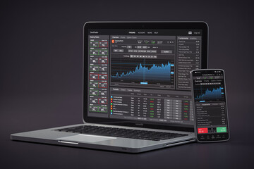 Stock exchange market concept. lLaptop and smartphone with stock trader application, graphs and diagrams on screen.