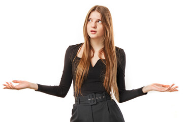 portrait of surprised young girl throwing up her hands and shrugging shoulders