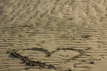 
Hearts painted on the sandy beach