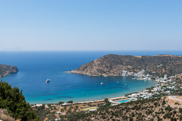 View from the top of beautiful Vathy bay and the turquoise clear waters of the beach. Sifnos island, Greece.