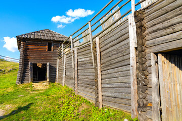 Wooden defense walls and tower of Gora Birow Mountain stronghold near Ogrodzieniec Castle, at Cracow-Czestochowa upland in Podzamcze od Silesia in Poland