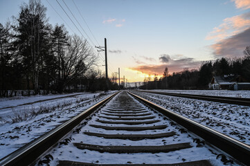 Winter sunset in the railway.