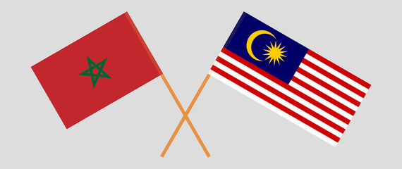 Crossed flags of Morocco and Malaysia. Official colors. Correct proportion