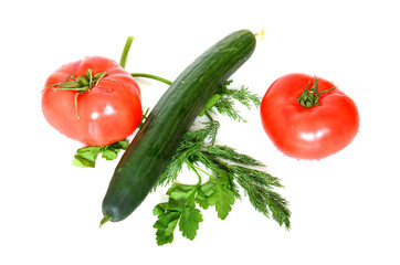 Vegetable salad ingredients. Tomatoes, cucumber, dill, parsley