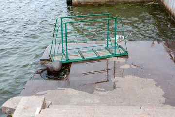 Boarding ramp lies on pier