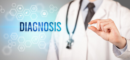 Close-up of a doctor giving you a pill with DIAGNOSIS inscription, medical concept