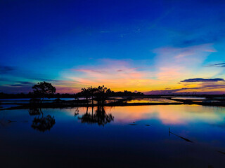 Fototapeta premium sunset over the river
