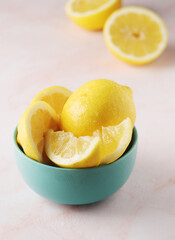 A bowl with yellow bright lemons
