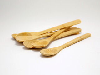 Bamboo spoons. Ecological wooden spoons.  Isolated. White background with copy space,