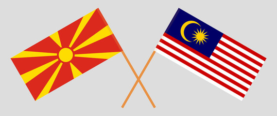 Crossed flags of North Macedonia and Malaysia. Official colors. Correct proportion