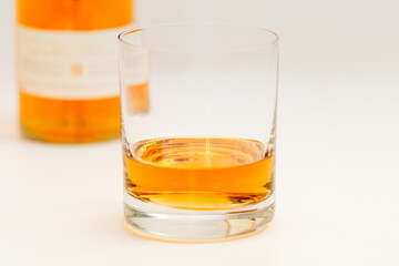 glas of whiskey on white