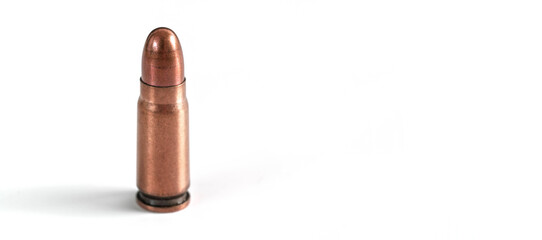 Bronze pistol bullet isolated on white, space for text right side