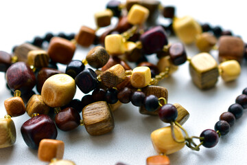 Beautiful wooden beads on a white background