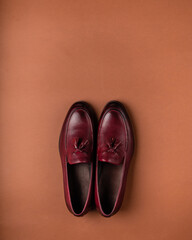 Brown leather men's shoes of classic style, a pair of shoes with tassels