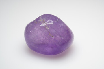 Natural stone amethyst on white background