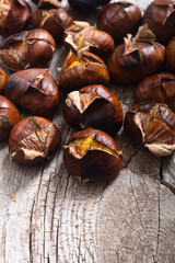 Tasty fried chestnut snack background