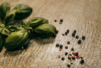 Basil leaves and sprinkled peppercorns