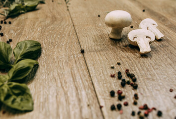 Basil leaves and sliced mushrooms