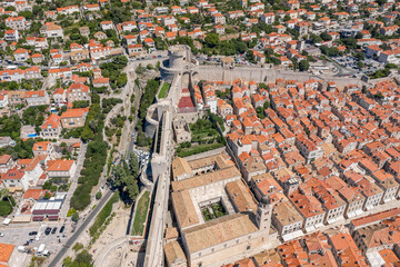 Aerial drone shot of City wall Fort Minceta in Dubrovnik old town in Croatia summer noon