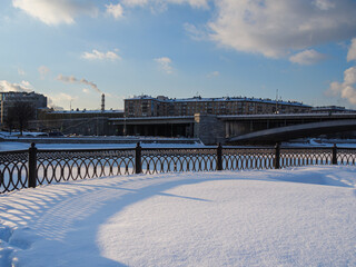 Bridge over Moscow river and embankment: the fresh snow