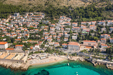 Aerial drone photo of Banje beach outside Dubrovnik old town city wall in Croatia summer morning
