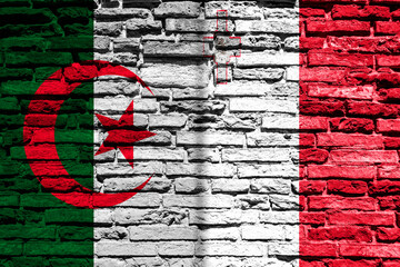 Flag of Algeria and Malta on brick wall