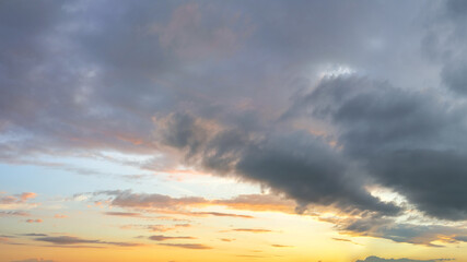 Natural background: dramatic stormy sky at sunset