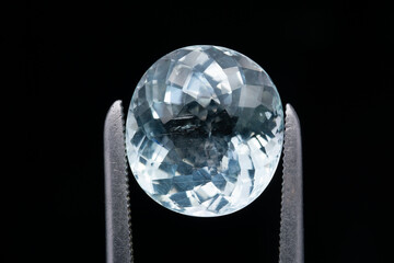 Natural stone aquamarine on a black background